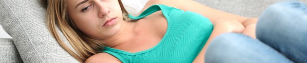 Woman having abdominal pain