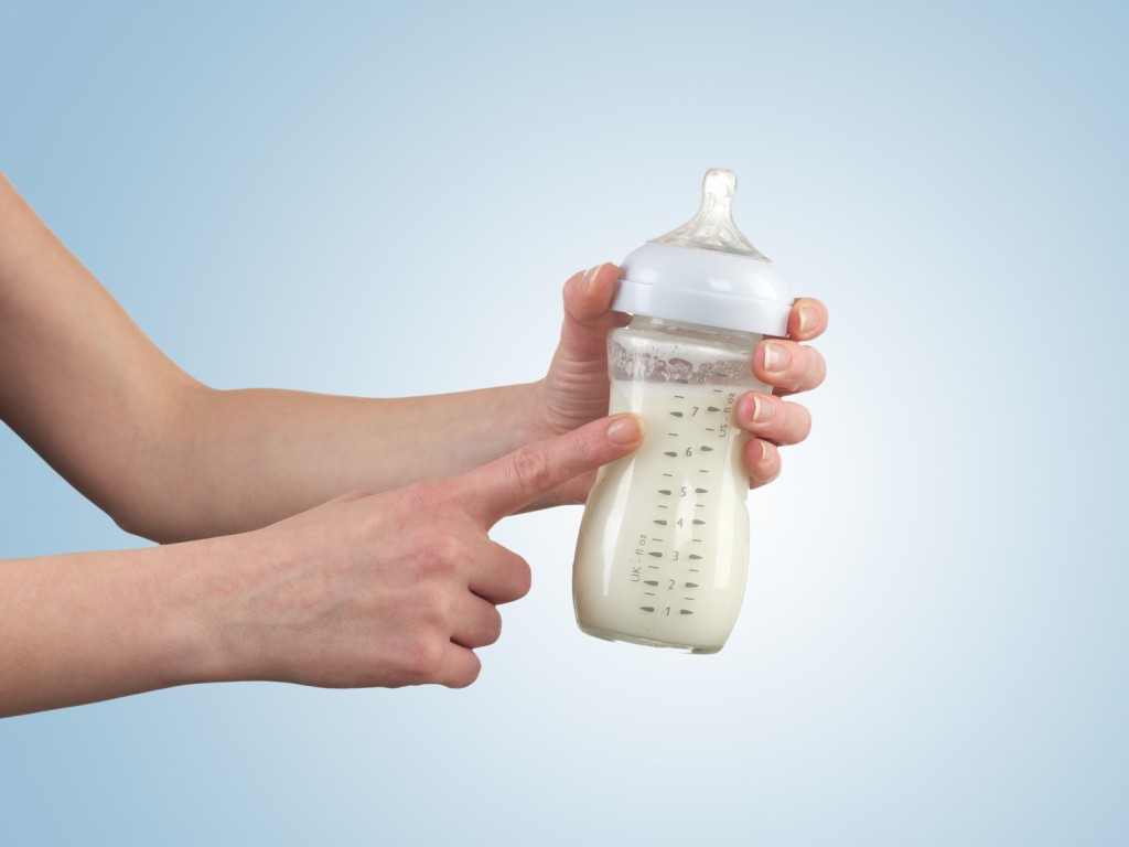 Powdered milk in bottle, dairy food for baby