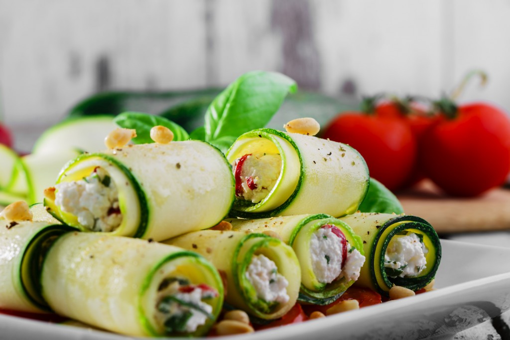 zucchini rolls with feta cheese and pine nuts